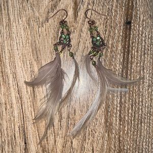 Handmade brass and green earrings with feathers